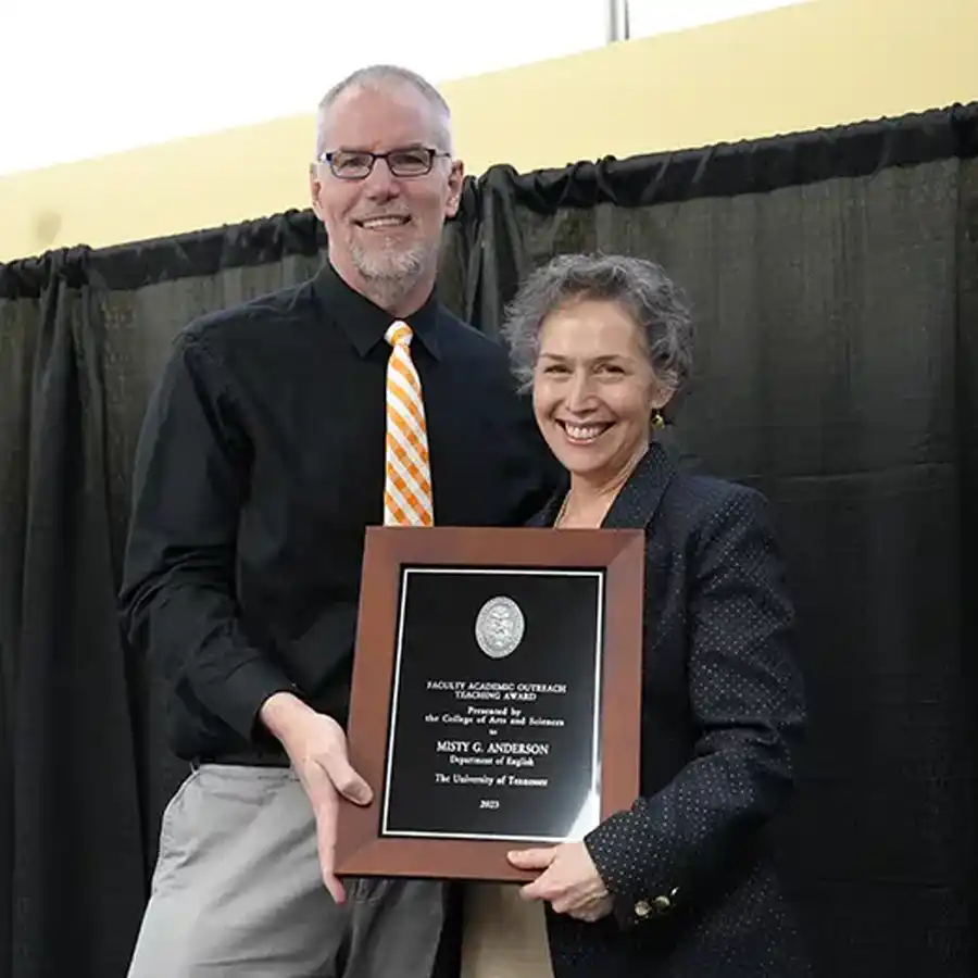 A photo of Misty Anderson with her award