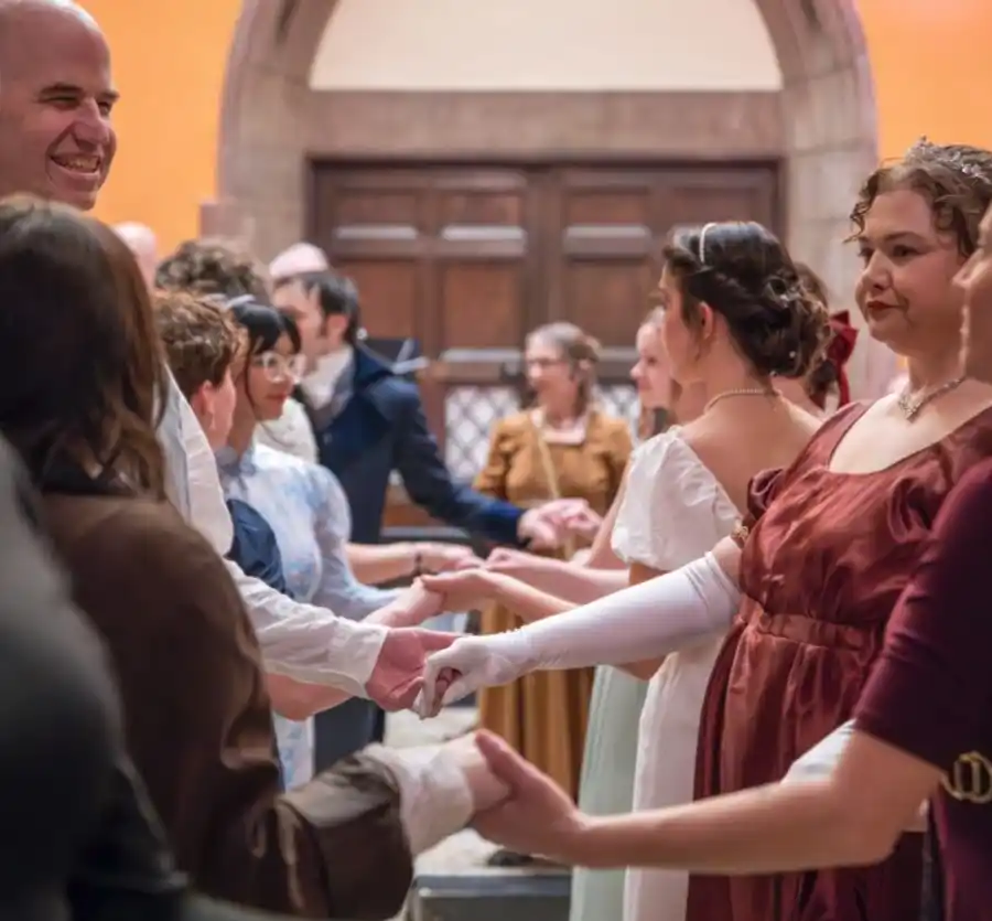 Image of lords and ladies dancing at the Regency Ball